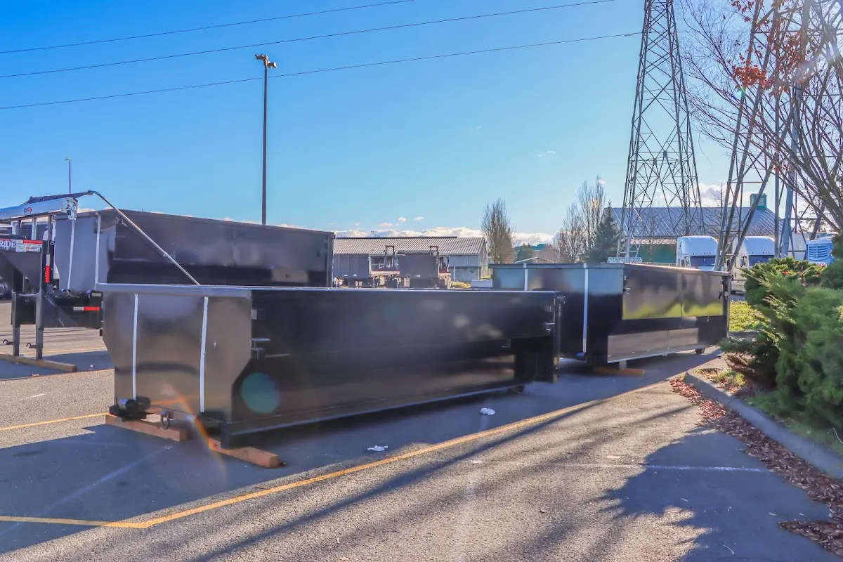 Roll-off dumpster ready for waste disposal at job site for 2 Yard Dumpster Rental in North Coventry